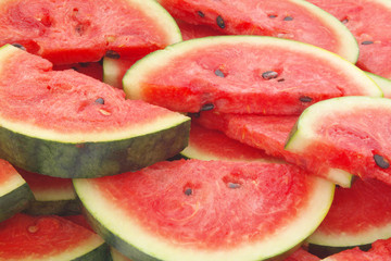 Slices of ripe red watermelon close up