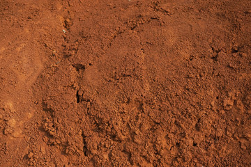 Abstract rough red soil texture 