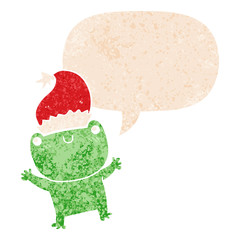 cute cartoon frog wearing christmas hat and speech bubble in retro textured style