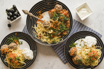 Top view delicious pasta and meatballs dish