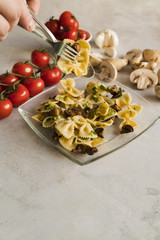 Pasta dish with mushrooms and tomatoes