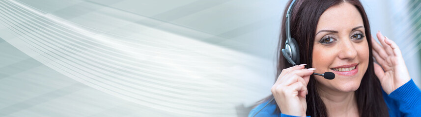 Smiling woman using an headset. panoramic banner