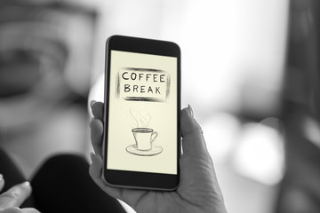 Coffee break concept on a smartphone