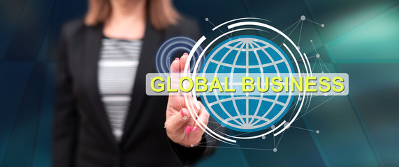 Woman touching a global business concept
