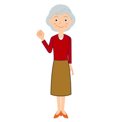 ガッツポーズをするシニア女性