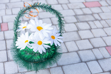 Memorial wreaths of artificial flowers