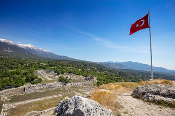 Naklejka premium Tlos is an ancient ruined Lycian hilltop citadel near the resort town of Fethiye in the Mugla Province of southern Turkey