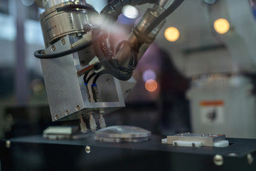automation machine and detail close up in machine automatic with robotic automation technology for technology production factory