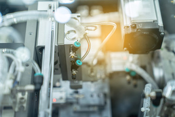 automation machine and detail close up in machine automatic with robotic automation technology for technology production factory