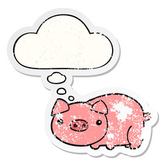cartoon pig and thought bubble as a distressed worn sticker