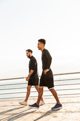 Two attractive young healthy sportsmen outdoors