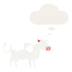 cartoon cow and thought bubble in retro style