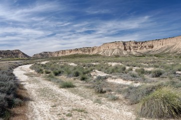 Trail winding in a desert landscape in northern Spain