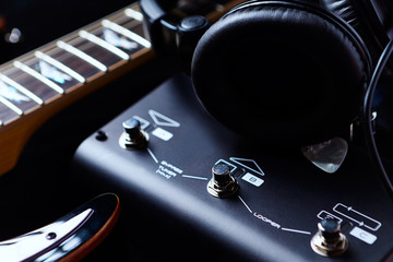 Multieffects Processor for Electric Guitar on black background. 