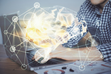 Man typing on keyboard background with brain hologram. Concept of big Data.