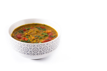 Indian lentil soup dal (dhal) in a bowl isolated on white background. Copyspace