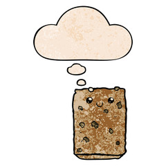 cartoon biscuit and thought bubble in grunge texture pattern style