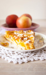 Homemade baked slice fruit berry tart, pie or cake on plate with cotton napkin. Holyday concept