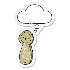 cartoon spoon and thought bubble as a distressed worn sticker