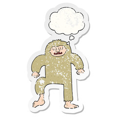 cartoon bigfoot and thought bubble as a distressed worn sticker