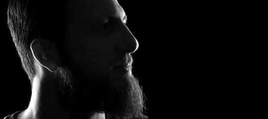 silhouette of a man on black background