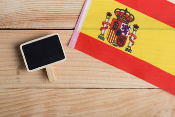 Spain Flag and blank blackboard. Copy space