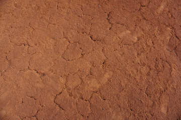 Abstract rough red soil texture 