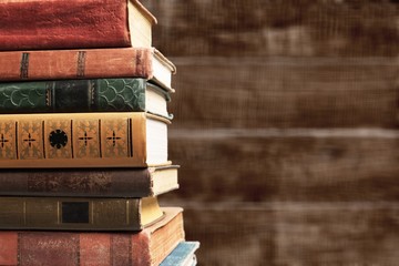 Old Books stacked on background.