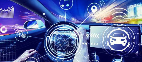 Person driving a new electric vehicle from inside