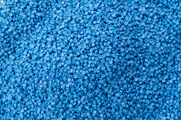 Fototapeta na wymiar Close-up of plastic polymer granules. hand hold Polymer pellets. polymer plastic. compound polymer.