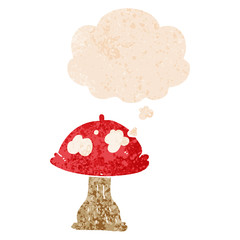 cartoon mushroom and thought bubble in retro textured style