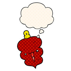 cartoon christmas decoration bauble and thought bubble in comic book style