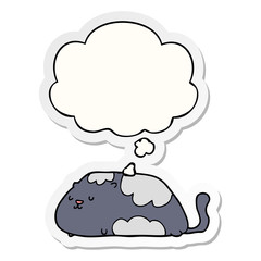 cartoon cat and thought bubble as a printed sticker