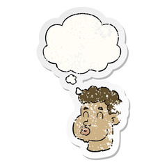 cartoon male face and thought bubble as a distressed worn sticker