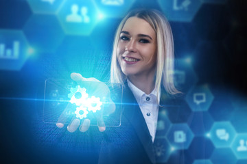 The concept of business, technology, the Internet and the network. A young entrepreneur working on...