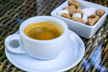 Cup of Italian Style Espresso Coffee With A Sugar Bowl