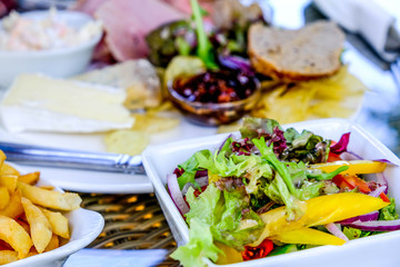 Bowl of Chips and a Ploughmans Lunch With Salad