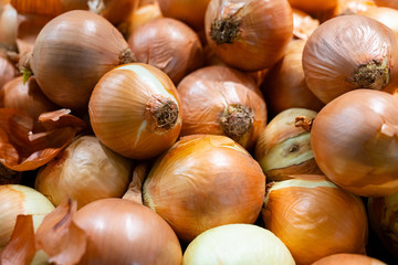 Full frame of fresh onions for sell at the market