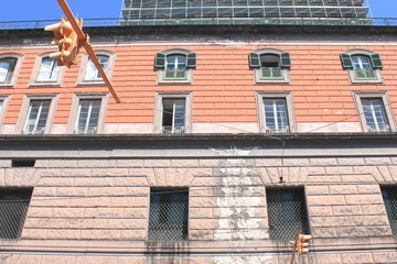 Traditional facade of European architecture with windows and balconies