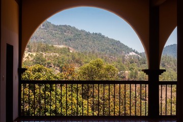 A view trough an arch of the mountains