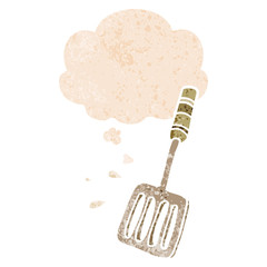 cartoon kitchen spatula and thought bubble in retro textured style