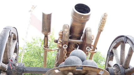 Reconstructed Bronze gun on a wooden carriage with cast-iron cores