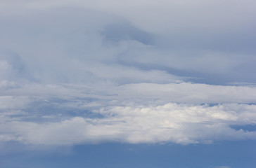Obraz premium Flying through blue sky with clouds