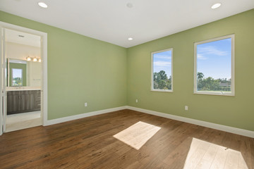 Vacant new construction with wood floors