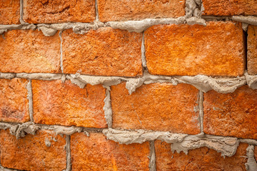 Rough Red Brick Wall with Mortar Drips and gaps