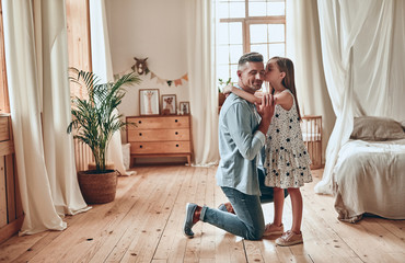 Father and daughter at home