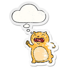 cartoon cat and thought bubble as a distressed worn sticker