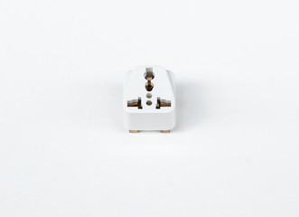 Universal adapter plug on the white canvas.