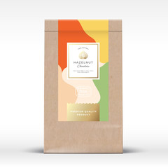 Craft Paper Bag with Hazelnut Chocolate Label. Abstract Vector Packaging Design Layout with Realistic Shadows. Modern Typography, Hand Drawn Nut Silhouette and Colorful Background.