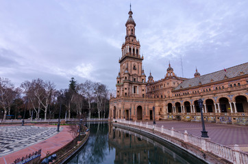 Fototapeta na wymiar Tourism in the city of Seville, Plaza de España, Triana neighborhood, Rio Guadalquivir ...